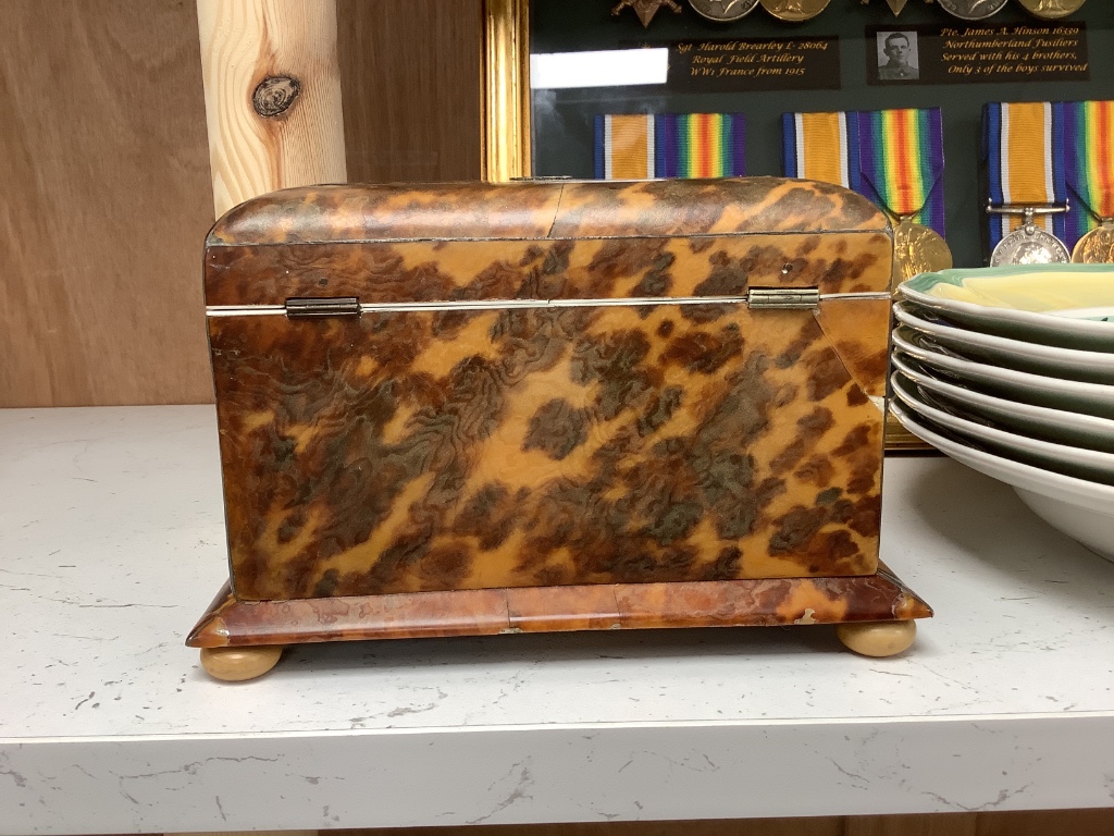 A 19th century tortoiseshell and ivory tea caddy, width 8.5cm height 11cm